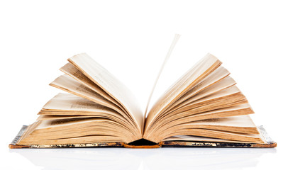 Old book open isolated on white background