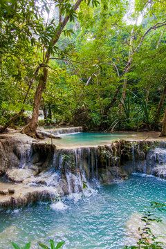 Fototapeta Tropical waterfall.  Deep forest Waterfall.  waterfall in the fo