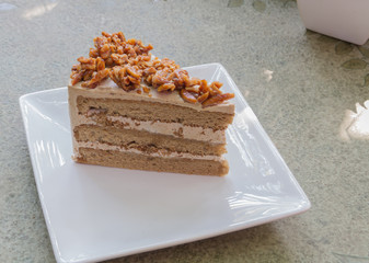 Almond cake on white dish