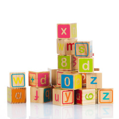 wooden toy cubes with letters. Wooden alphabet blocks.