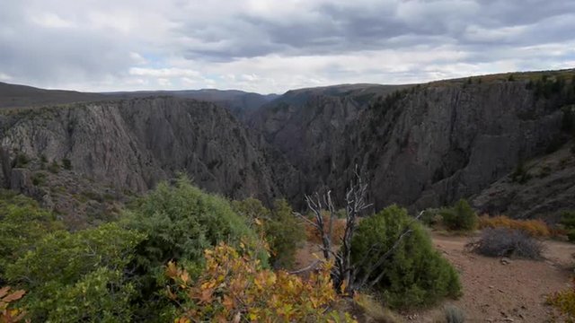 Fall Colors at Tomichi Point view of layers of cliffs at Black Canyon of the Gunnison 
