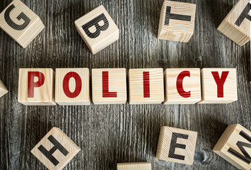 Wooden Blocks with the text: Policy