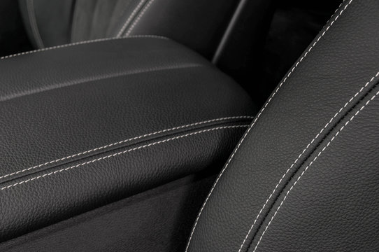 Detail of leather car interior. Leather background.