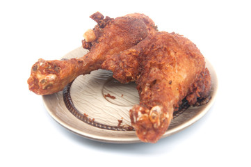 Two Fried chicken drumstick isolated on white