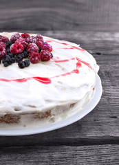 Cake with berries for holiday. Toned image. Selective focus