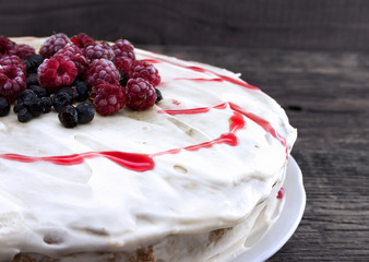 Cake with berries for holiday. Toned image. Selective focus