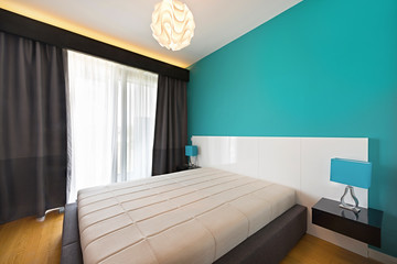 Interior of a modern bedroom design in the morning