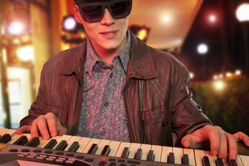 Man playing synthesizer