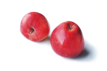 Organic natural red ripe apples on isolated white background.