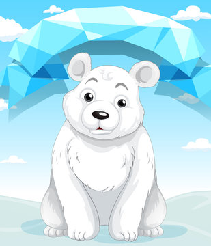 Little polar bear sitting on ice