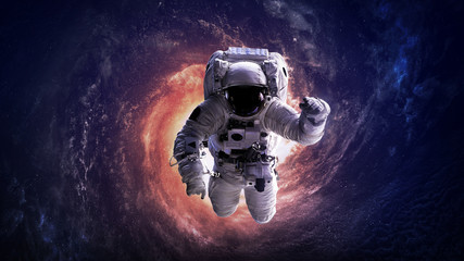 Obraz na płótnie Canvas Astronaut in outer space. Elements of this image furnished by NASA