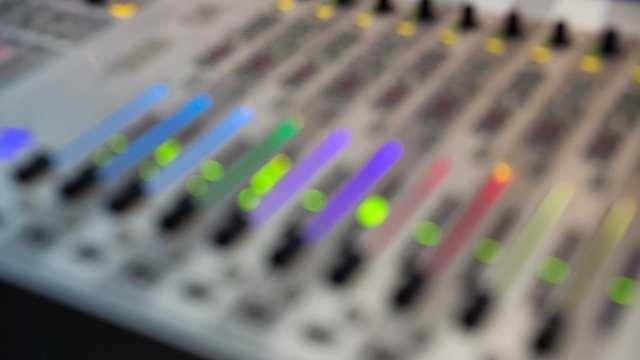 Sound producer Working On A Audio Mixing Console, Sound Mixer, From Focus To Out Of Focus