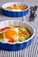 Fried eggs with vegetables