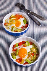 Fried eggs with vegetables