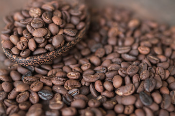 wooden spoon with coffee beans