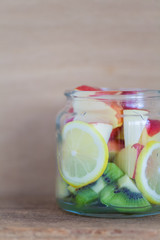 Fruit and Vegetable in glass bottle for made detox water recipe