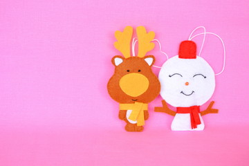 Handmade felt deer and snowman