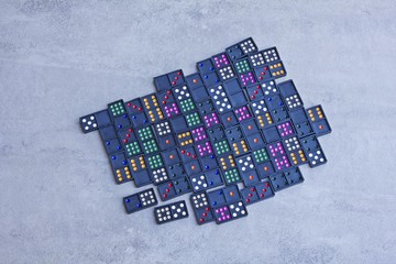 Pile of colorful dominoes - plastic Domino Game
