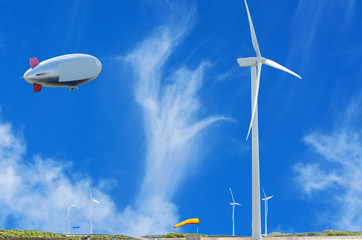 Luftschiff,Zeppelin und Windkraftanlage © JFsPic