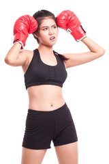 Boxer - fitness woman boxing wearing boxing gloves on white background.