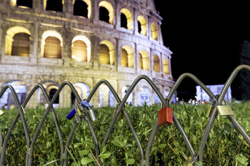 Red padlock in front of the Colosseum in Rome