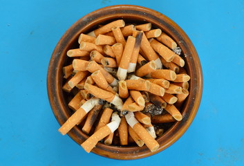 cigarette filter in ceramic ashtray
