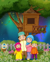 Muslim family in the garden at night