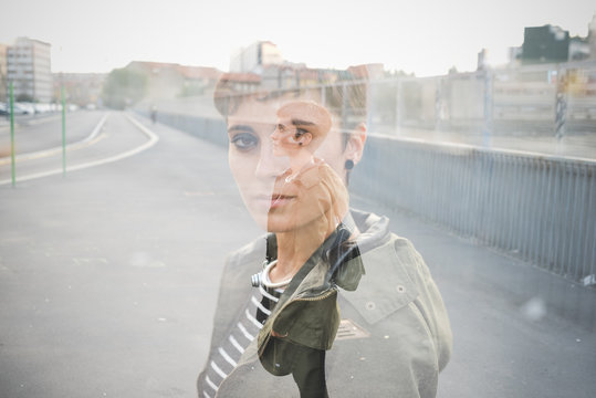 Double exposure half length portrait of young handsome caucasian