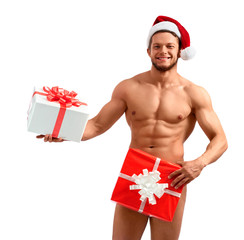 Sexiest Santa. Naked Santa Claus covering himself with a present posing against white background wearing Christmas hat