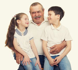 Grandfather and grandchildren portrait