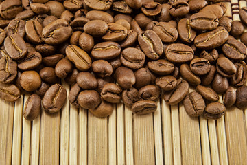 Coffee beans on vintage wooden board