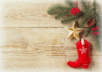 christmas background with cowboy shoe decoration