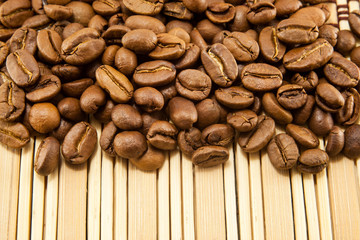 Coffee beans on vintage wooden board