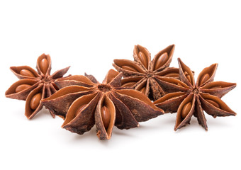 Star anise spice fruits and seeds isolated on white background c