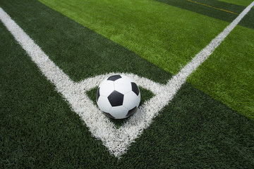 Fototapeta na wymiar soccer ball or football on soccer field