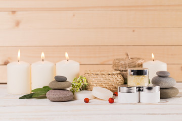 Composition of spa treatment on the white wooden table