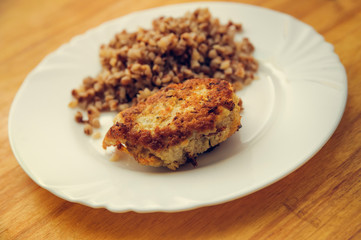 economy food. rissole and buckwheat groats
