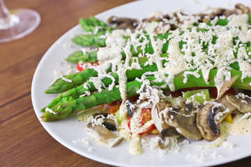 Delicious vegetables dish on served wooden table, close up