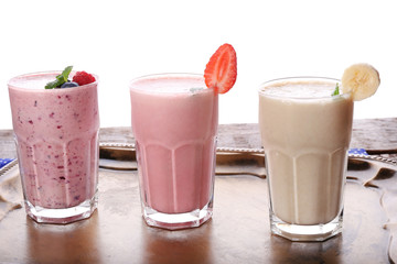 Milk shakes on white background