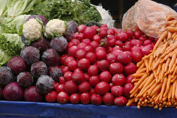Vegetables and fruits on food stall in a market 