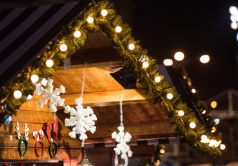 Wood house with Christmas decoration in a Christmas Market
