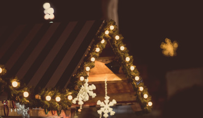 Wood house with Christmas decoration in a Christmas Market