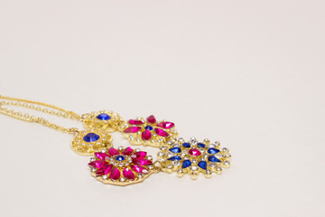 Necklaces and ornaments on a white background