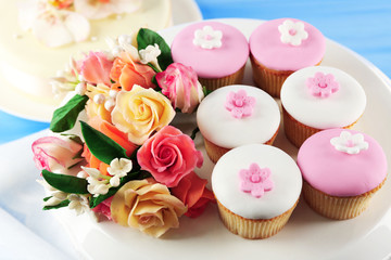 Tasty cupcake on stand, close-up