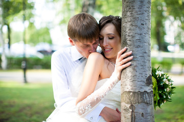 cute couple full in love on the background wonderful fountain in park 