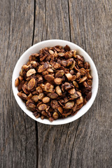 Chocolate granola in bow, top view