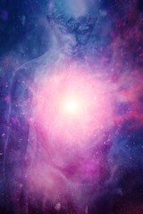 Fototapeta premium Blue pink clouds with spiritual light in the middle and blurred outline of a man in the background