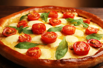 Pizza Margherita with arugula, close-up