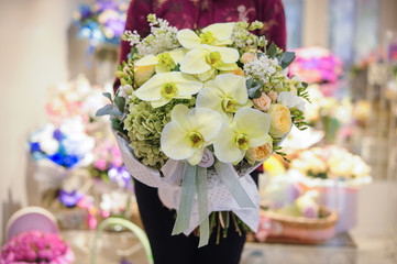 big white bouquet with huge orchids