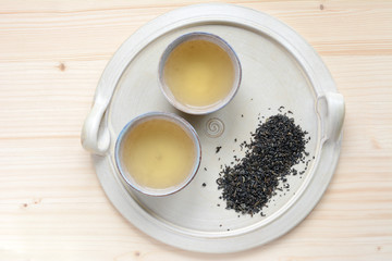 Tea set on a ceramic plate